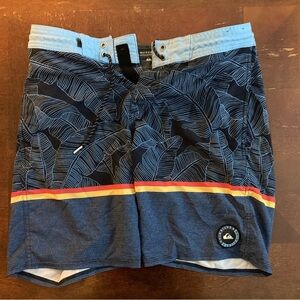 Quicksilver board shorts. Size 30. Floral pattern. Never worn.